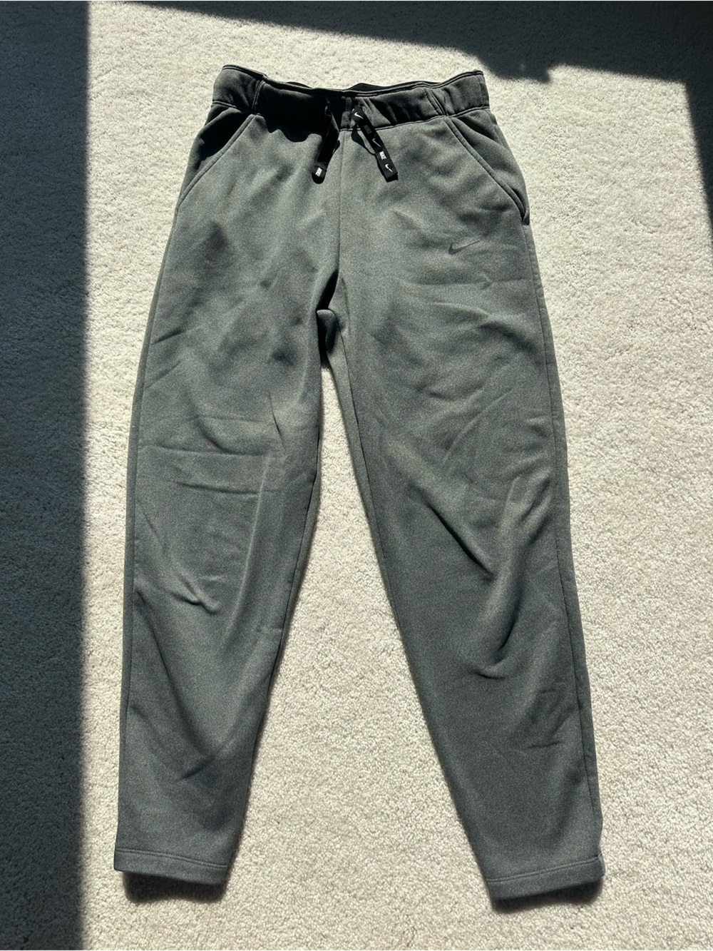 Nike Women's Ankle-Length Cropped Fleece Joggers in Dark Gray